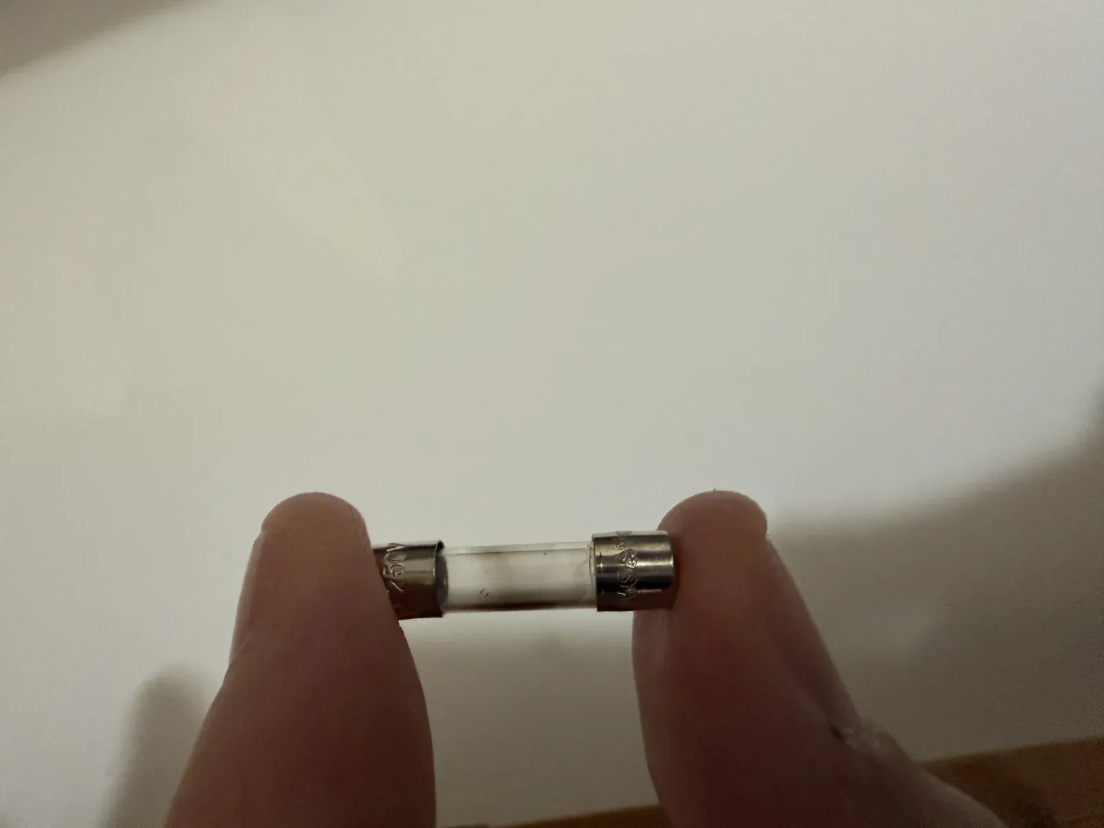 A blown T2A glass fuse from the Robur DDC controller
